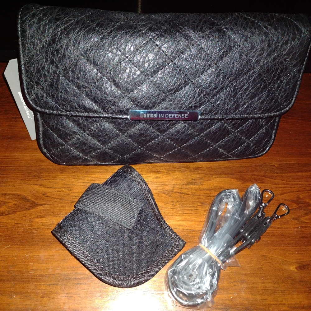 Damsel in Defense Black Quilted Clutch
